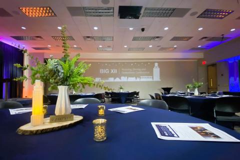 Meeting hall with table and blue tablecloth